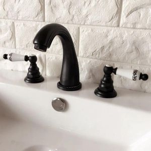 Rubinetti del lavandino da bagno olio nero strofinato doppio bronzo manici 3 fori installare un mixer rubinetto a bacino montato a ponte tocco MHG060