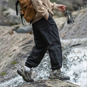 TFETTERS Autumn Men Cargo Pants Multi Pocket Waterproof Solid Color Casual 100% Nylon Outdoors Tourism Clothes 240402