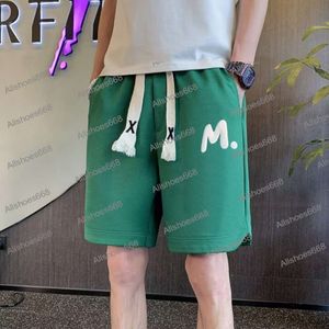 2024 Nya designer shorts för män sommar lös casual broderi mode trendiga delade mäns raka sportbyxor