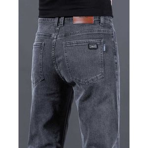 Jeans da moda e moda de ponta para homens outono inverno 2023 novo tubo reto de calças casuais soltas versáteis longas