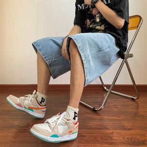 Men's Shorts South Korean Harajuku mens summer denim shorts retro matching bag straight bottom wide leg high street five point denim pants J240407