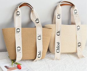 Bolsa de grife de designer Summer feminina moda feminina tecido vegetal saco de cesta de praia bolsa de palha de palha bolsas de ombro de moda de luxo 3Colour