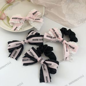 INS Girls Letter Stampato Ribbon Bows Accessori Designer Kids Patchwork Bows Bows Acconciatura Donne di lusso Ring Elastico grande Scrifie Z2869