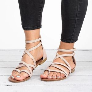 Sandaler damer korsar remmen Flat 2024 Sommarens kausala skor för kvinnor Set Toe Women's Gladiator Roman