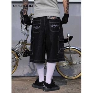 Men's Shorts Embroidered floral bag over knee Jorts mens retro wide leg pocket short denim oversized denim five point pants J240407