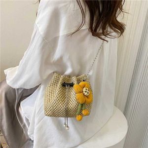 Bolsas de praia diárias de desgaste para a cadeia de verão Bucket portátil com elegante design de palha crossbody Trendy