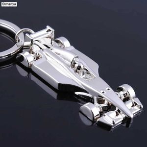 Keychains Lanyards Ny anlända Racing Key Chain Silver Color Alloy Full Wheel Car F1 Keychain for Christmas Gift Ring 17026 Q240403