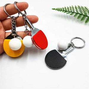 Tornari percorsi 14 pezzi/lotto Creative Key Chain Sports Fans Souvenir Table Tennis Racket e Ball Keychain Metal Mini Ping Pong Keyring Q240403