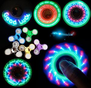 LED -ljus snurrande topp coolast föränderliga fidget spinners finger leksak barn leksaker auto byte mönster med regnbåge upp hand spinner2611353