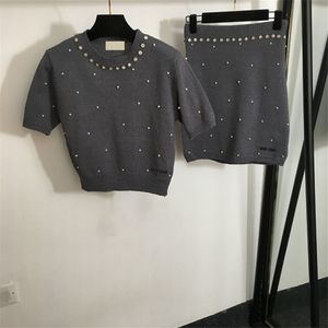 Set di gonne top a maglia a maglia set di lungometraggi di lusso da donne eleganti abiti abiti abiti casual giacca da serbatoio quotidiano set di gonne