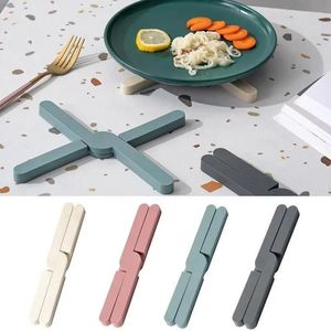 Tapetes de mesa de silicone dobrável trivet ponte almofadas de secagem resistente a calor para cozinha (em forma de x dobrável)