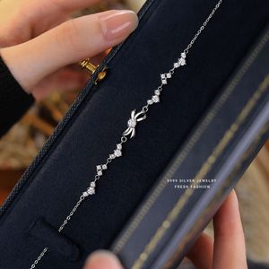 S999 Sier Sier Sparkling Zircon Bow Bracelet بأسلوب متعدد الاستخدامات ، فتاة جميلة حلوة ولطيفة الحرف اليدوية