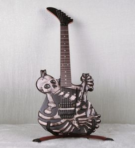 Ręcznie rzeźbiony J Frog George Lynch Skull and Bones Electric Gitara Pełna Pływająca oryginalna Floyd Rose Tremolo Ebony Tfulardboard Korea8065590