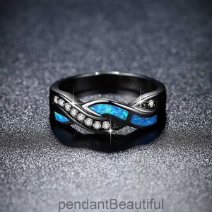 Modische Wellenring Frauen Blau Opal weißer Diamantkreuz Schwarzer Ring Schmuck Schmuck