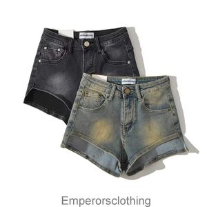 American washed and distressed denim shorts for womens summer 2023 spicy girl style high waisted irregular sexy hot pants