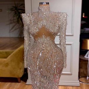 Sukienka wieczorowa sukienka Midriff Cutout Sukienka z wysokim dekoltem i długimi rękawami Yousef Aljasmi Kim Kardashian Kylie JE3527662