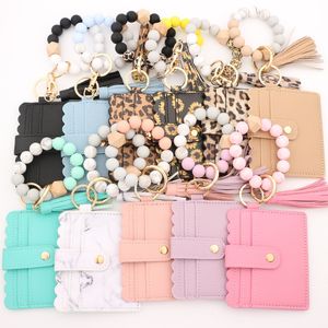 Silicone Bead Material Bracelet Card Bag Leopard Pattern Silicone Bead Bracelet PU Tassel Women's Wallet Leather Tassel Keychain Cross border