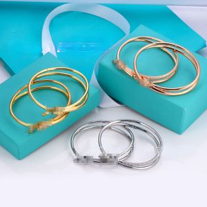 BANGLES DESIGNER NUOVO Bracciale diamantato nodo placcata 18k oro europeo e americano Bracciale per cerniere a doppia fila liscia a doppia fila