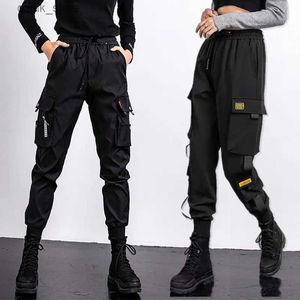 سراويل جينز للسيدات S-5XL Strtwear Cargo Pants Womens مرنة الخصر فضفاضة لركض السيدات الرياضة الرياضة سروال السراويل غير الرسمية Y240408