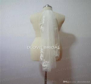 Real Po Cheap Veils Short Designer Single Cut Applique Crystal Elbow Längd Två lager bröllopslöja med kamhög kvalitet 6652252