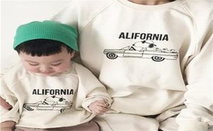 3999 Korean Parentchild Giysileri Sıradan Mektup Karikatür Baskılı Bebek Erkekler Gevşek Sweatershirt Kız Tops 2106211690858