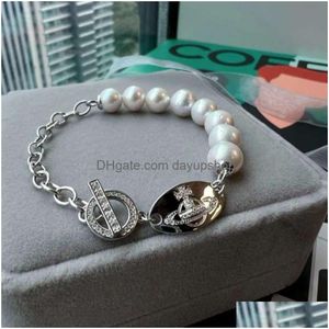 Beaded Designer High Quality 23 New Western Empress Dowager Diamond Oval Pearl Bracelet For Womens Fashion Small Versatile Handicraft Dhibt