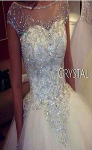 Luxurious Rhinestones Crystals Princess Wedding Dresses 2019 Selling New Real Image Cap Sleeve Ball Gown Tulle Sheer Bridal Go8794013