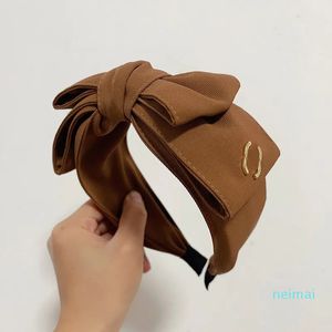 Дизайнер -дизайнер повязкой повязки для волос группы женская девушка модная марка