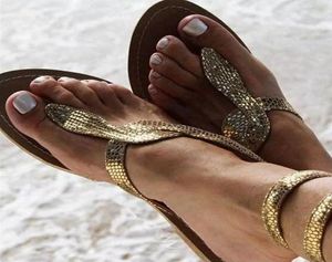 Sandaler Kvinnor Flats 2022 Summer Snake Ankle Strap Bling Gold Beach Flat Shoes Storlek 35-432502145