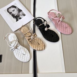 2024 Sommer Cowhide Leder Frauen Sandalen Strass mit Bowknot Luxus Designer Pantoffeln für Frauen flacher Boden Damen Casual Sandals Hochzeitsfeierschuhe