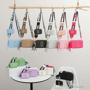 Crowd Design Womens Bag 2024 Spring Nuovo stile alla moda Bambino Mother Camera Borsa porta portatile 10 colori