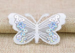 10個のスパンコール蝶のパッチ衣類用バッジ鉄刺繍パッチアップリケ鉄の縫製パッチ縫製アクセサリーDIY7030055