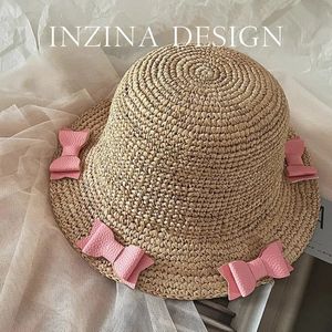 Y2k tatlı havalı yay kovası şapka kız kişiliği orijinal tasarım hasır şapka kadınlar kore yaz ins stil içi boş katlanır güneş şapkası 240404
