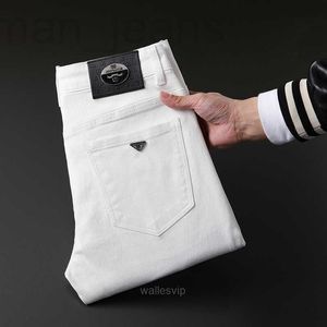 Mens Jeans Designer White för våren 2024 Nytt high end modemärke Slim Fit Feet Elastic Casual Pants NJB7