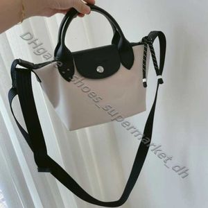 Single Straddle 2024 Dumpling Cross Body Påsar för kvinnor 2024 Bag Luxury Crossbody Shoulder Handheld Canvas Childrens Medium Skew Purses Tote Luxurys Handbag Sac