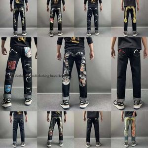 Jeans de moda de alta qualidade designer de estilo legal jeans calça angustiada motociclista raspada azul jean jean slim fit motocicleta