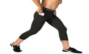 3 4 lunghezza pantaloni di compressione uomini leggings leggings da uomo allenamento capri gambe fitness maschi con tasche tocchi da palestra231l7244245