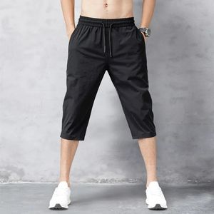 Mens Shorts Yaz Pantlar 2024 İnce Naylon 3/4 Uzunluk Pantolon Erkek Bermuda Tahtası Hızlı kurutma plajı siyah erkek uzun şort 240329