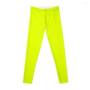 Pantaloni attivi chartreuse gelocchi di colore solido giallo sport sport da palestra che allena da donna