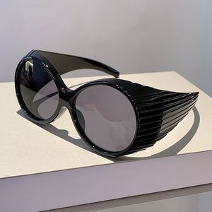 Designer Luxury Fashion Trendy Rock Shades Temperamento Letteratura retrò e occhiali da sole della personalità artistica per donne Trend transfrontaliero retrò