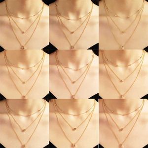 Подвесные ожерелья Простые сердца 26 букв подвесное ожерелье для женщин Boho 2021 Gold Metal Персонализированное ожерелье для девочек модные ювелирные изделия
