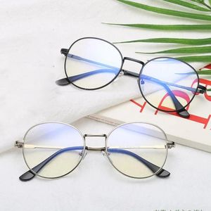 Solglasögon Metal Round Anti Blue Light Glasses Kvinnor Män klassiska ramar Transparenta glasögon Datoroptikala glasögon