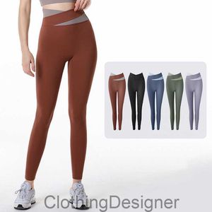 Ll kvinnliga yogapåsar Kontrast Färgkondition Legging Hög midja Push Up Sport Workout Leggings Scrupp Butt Kvinnliga sömlösa byxor