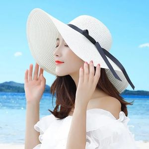 Sommarbrett grälvita halmhattar Big Sun For Women UV Protection Panama Floppy Beach Ladies Bow Hat Chapeau Femme240409