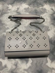 Bolsas de rebite de grife de grife feminino de couro lotado bolsa de ombro de couro de letra clássica Moda de moda para mochilas de meninas com caixa