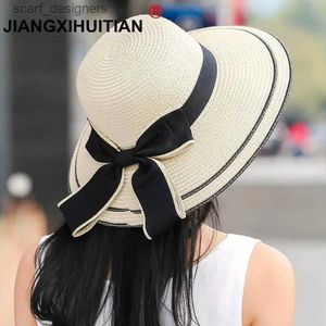 Szerokie brzegowe czapki wiadra czapki słoneczne wielkie czarne łuk letnie czapki dla kobiet składane słomki plażowe panama kapelusz wizor szerokie grzbiet femme żeński 2018 Nowy y240409