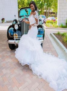 Abiti da sposa da sposa sirena a cascata con piffle con pizzo a maniche lunghe in rilievo africano abbigliamento africano9066981