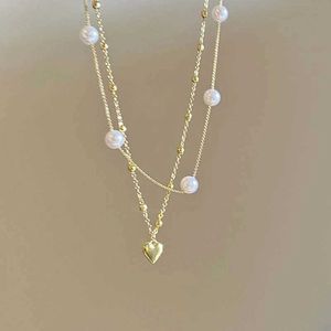 Pendant Necklaces New design double layered pearl love heart-shaped necklace suitable for womens elegant and exquisite pearl pendant necklaceQ