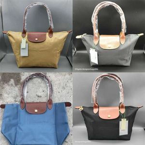 2024 Ladies designer wallet Waterproof bag Retail Wholesale 95% Off Women Cloth Folding Shopping Storage Handbag sac de jour Oxford Bags Large-capacity Fashion Mom