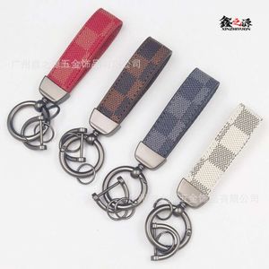 Klassische trendige Marke Old Flower Lederauto Hochwertiges Automobil Keychain Anti -Loss -Accessoires Anhänger